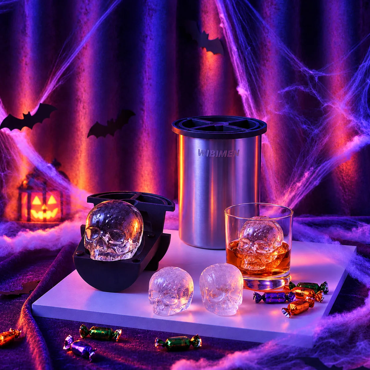 Skull ice maker and skull-shaped ice in a purple and orange Halloween setting