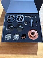 Customer example photo of an open smoker kit box with glassware and torch